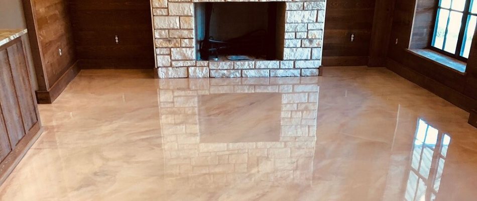 metallic epoxy floor next to fireplace Resilient and beautiful metallic epoxy flooring